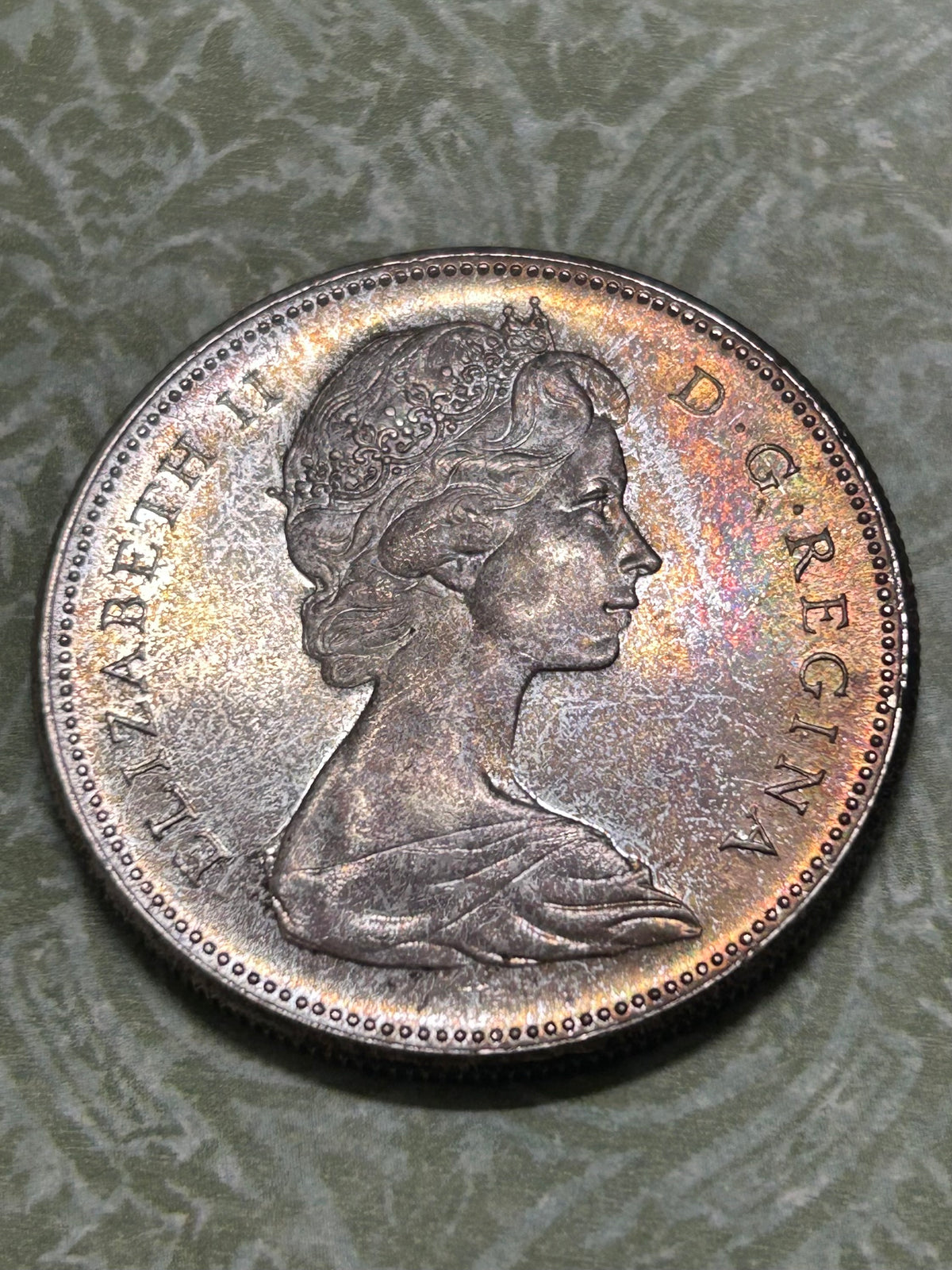 Beautifully Toned Canadian Centennial Silver Dollar