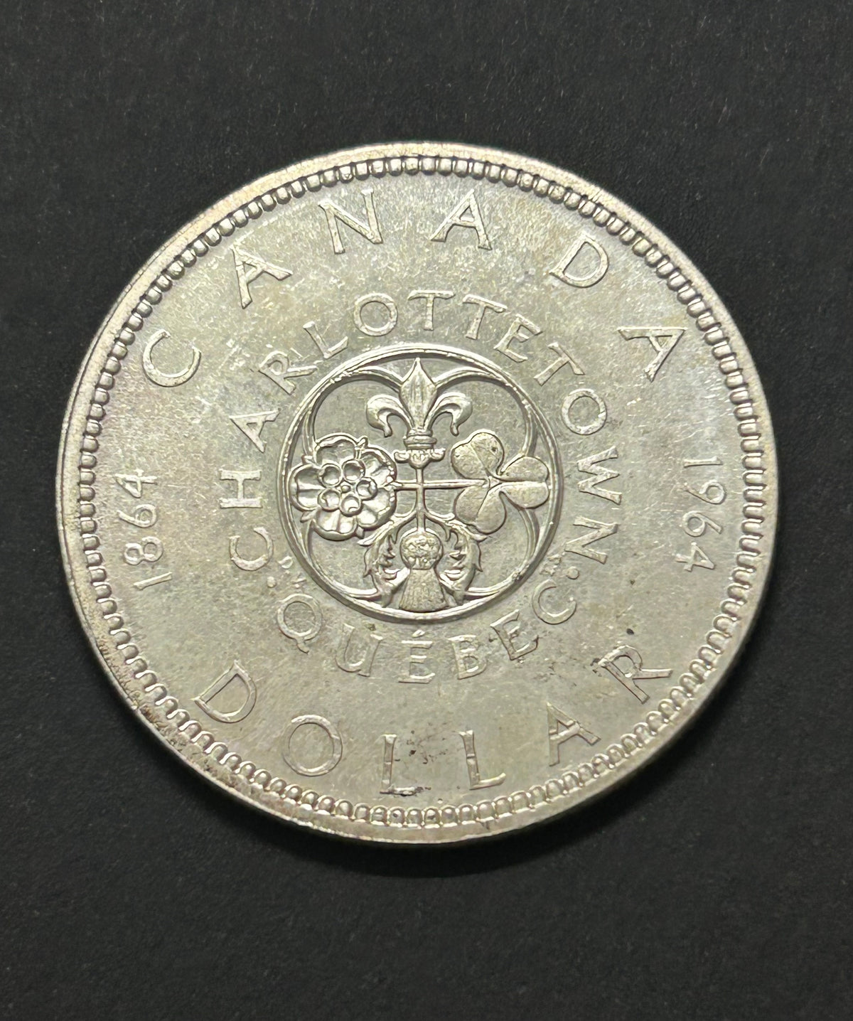 1964 Quebec Confederations Centennial Silver Dollar
