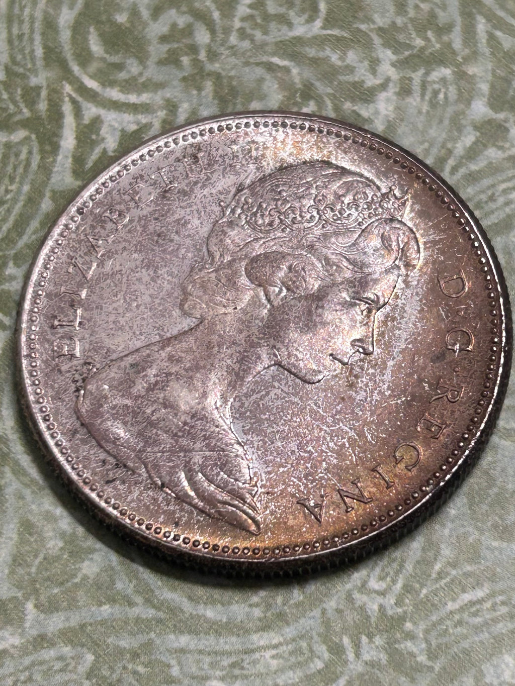 Beautifully Toned Canadian Centennial Silver Dollar