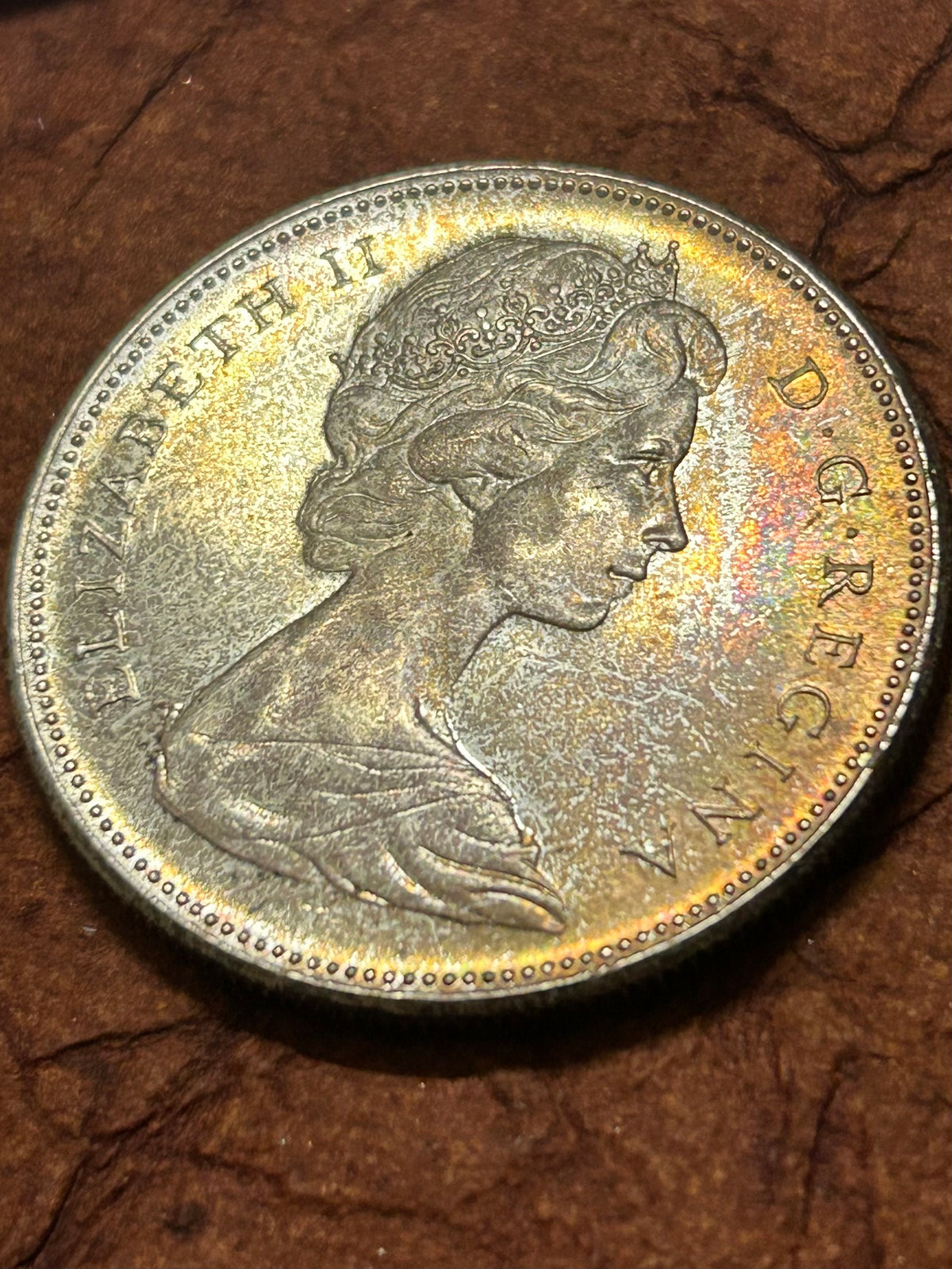 Beautifully Toned Canadian Centennial Silver Dollar