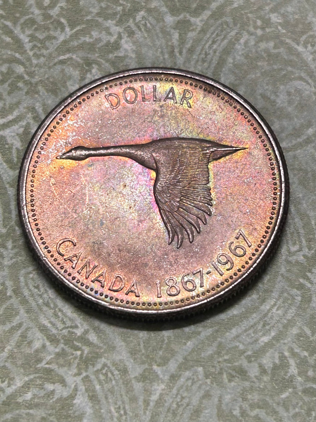 Beautifully Toned Canadian Centennial Silver Dollar