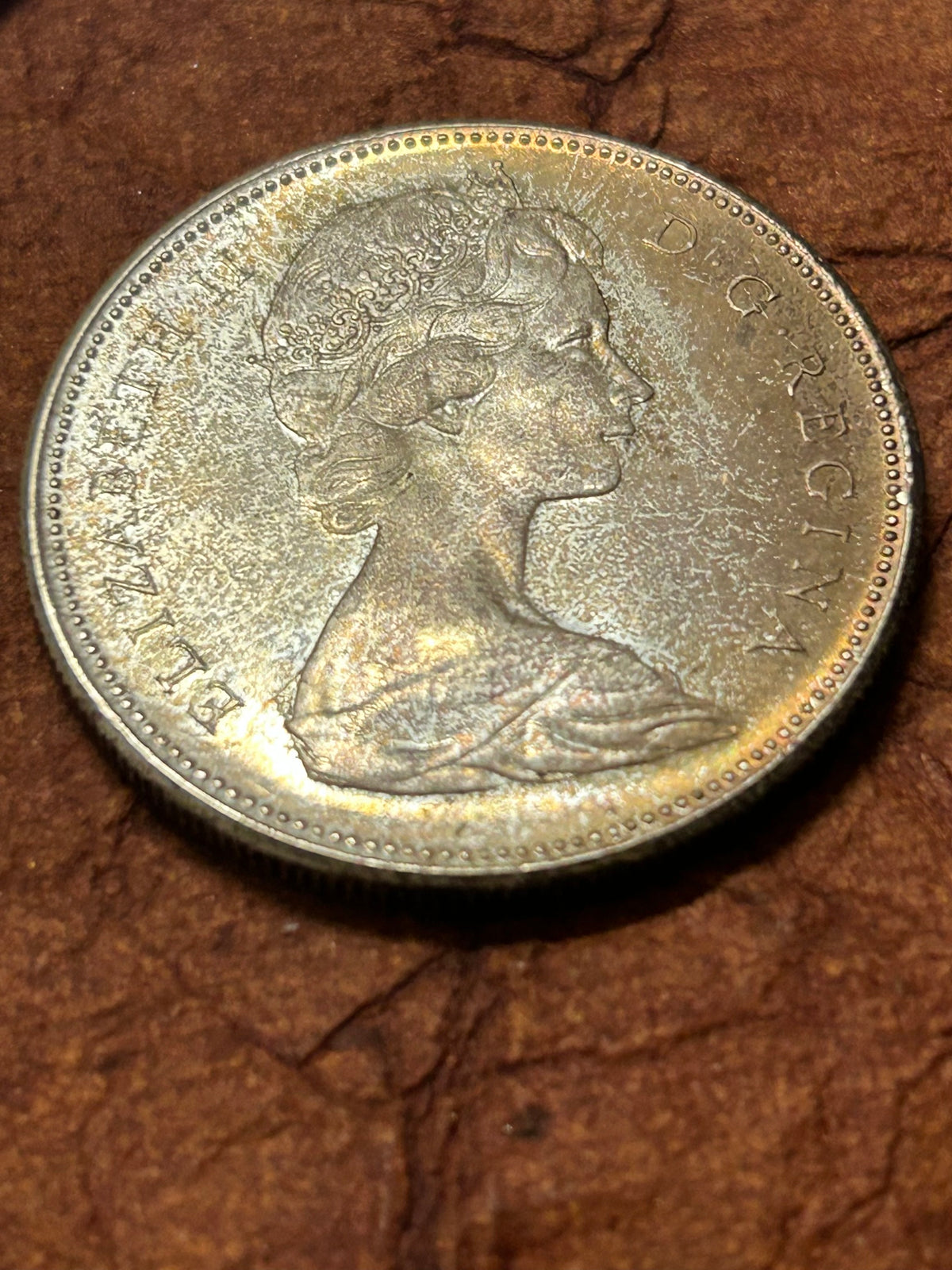 Beautifully Toned Canadian Centennial Silver Dollar